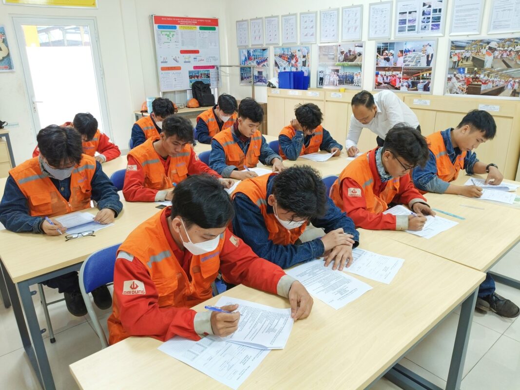 Students take the theory test in welding technology